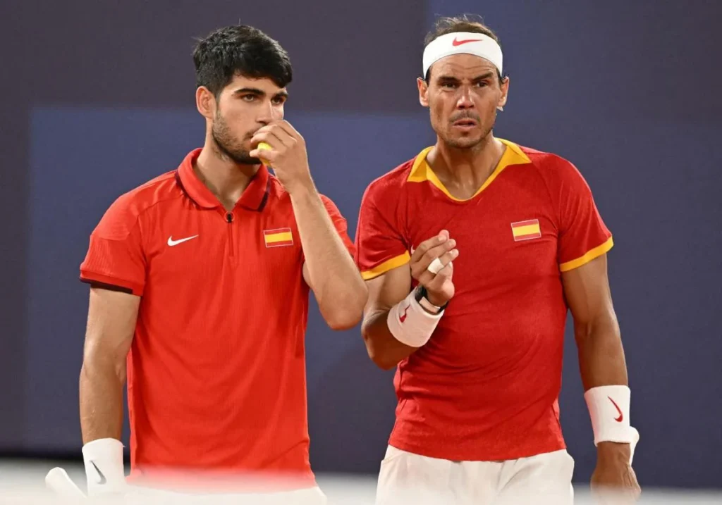 Nadal y alcaraz dialogando