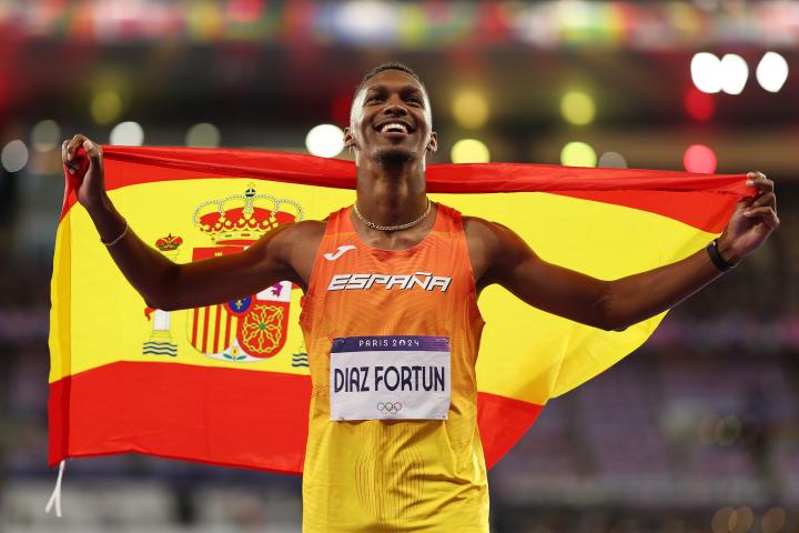 jordan diaz oro olímpico posando con la bandera de España
Día 14